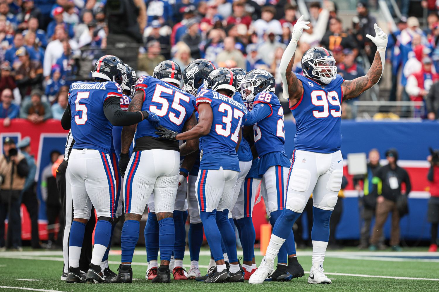 Oct 22, 2023; East Rutherford, New Jersey, USA; New York Giants defensive end Leonard Williams (99) gestures to the crowd before a fourth down during the fourth quarter against the Washington Commanders at MetLife Stadium.